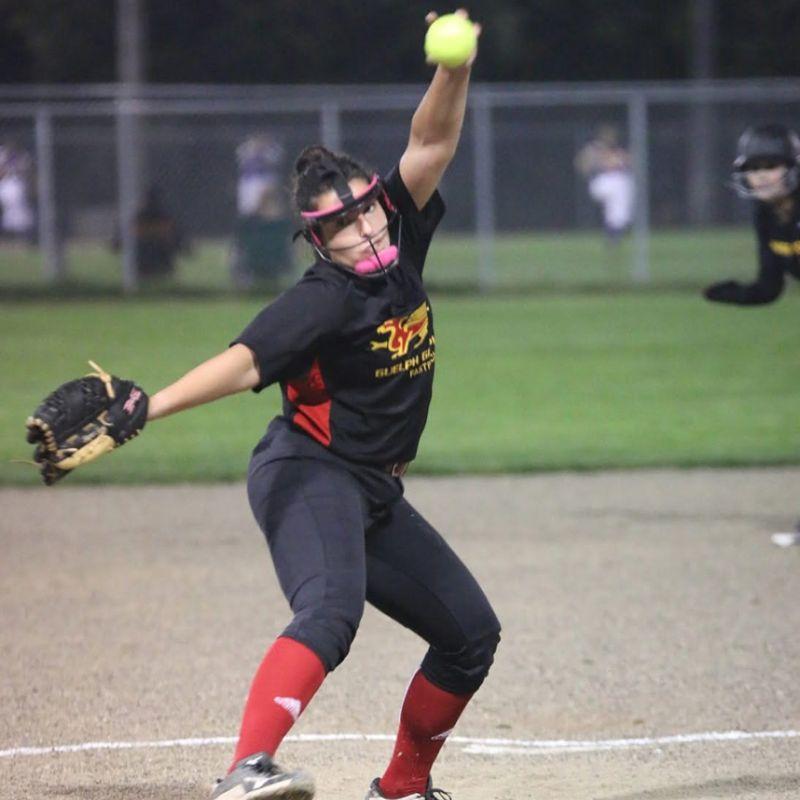 Guelph Gryphon softball player throwing a pitch.
