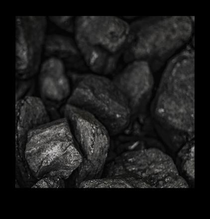 A pile of dark coal surrounded by Cannon Black.