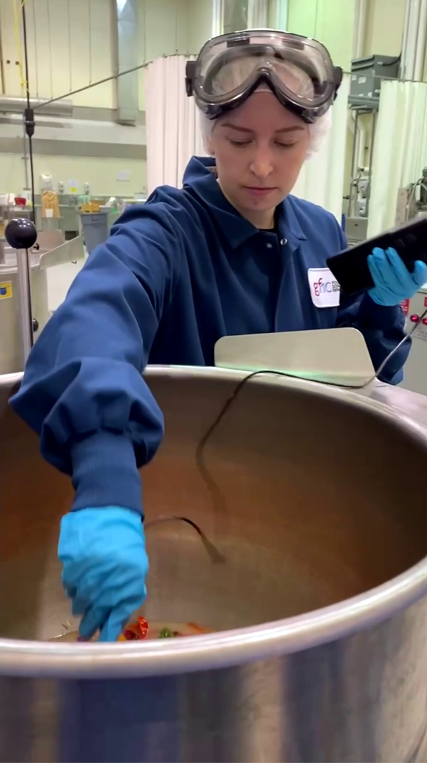 gillian cooking peppers in the food lab, wearing goggles