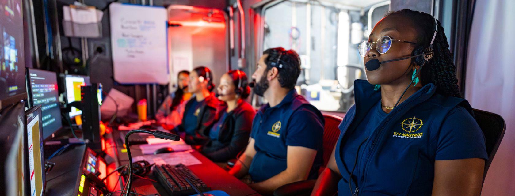Guelph Grad Moronke Harris working in the command centre helping to lead a deep-sea expedition