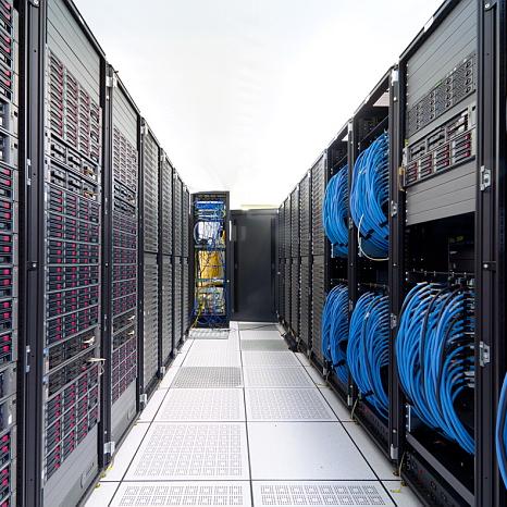 A row of servers and blue cables