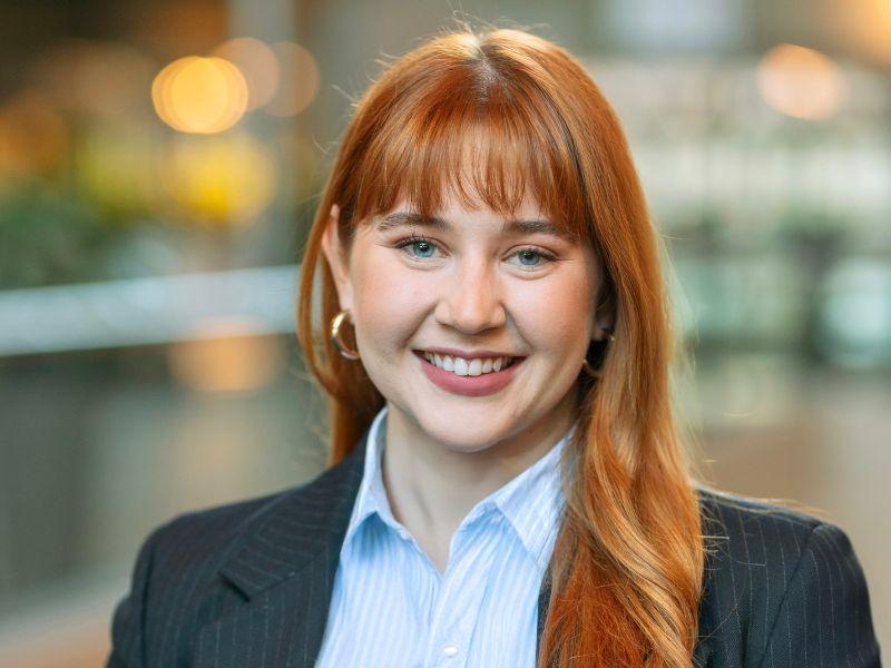 Business Grad Emily Winick poses for a professional portrait