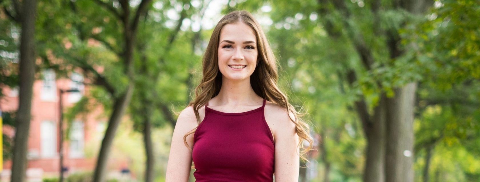 Guelph Grad Laura martin poses on campus. 