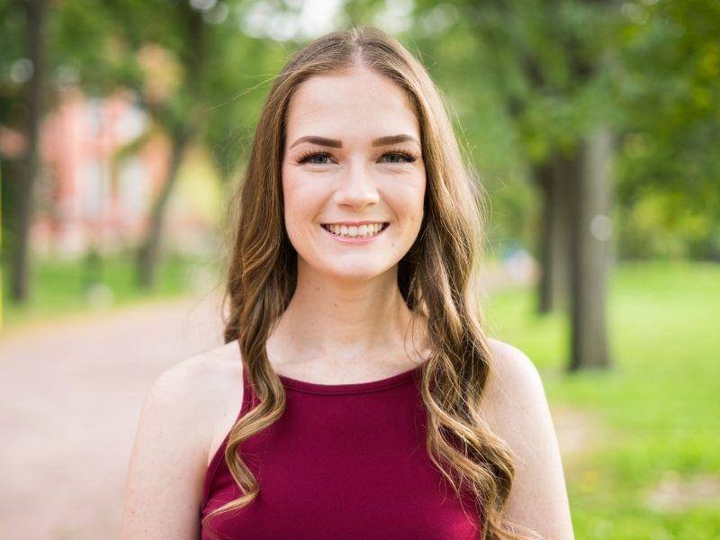 Guelph Grad Laura martin poses on campus. 