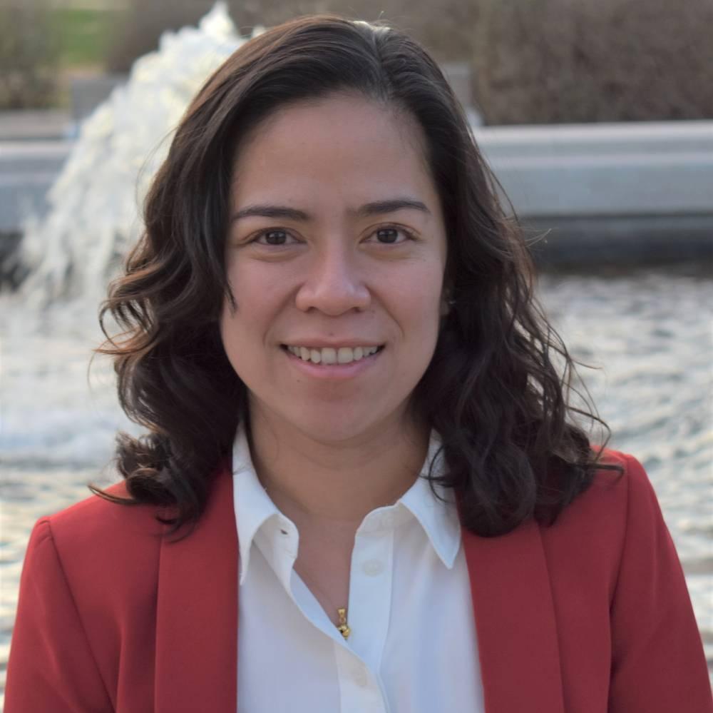 photo of Irish Pabuayon wearing a red jacket and white dress shirt