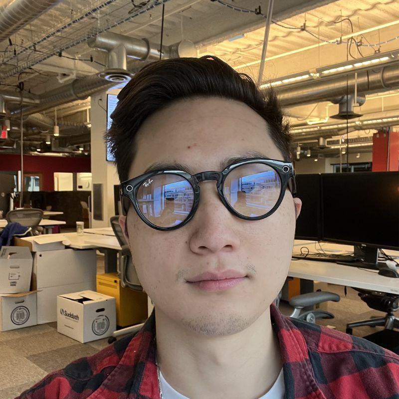 Computer science Grad Dennis Kao wearing Meta glasses.