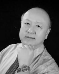 Dr. Ming Fang looking into the camera