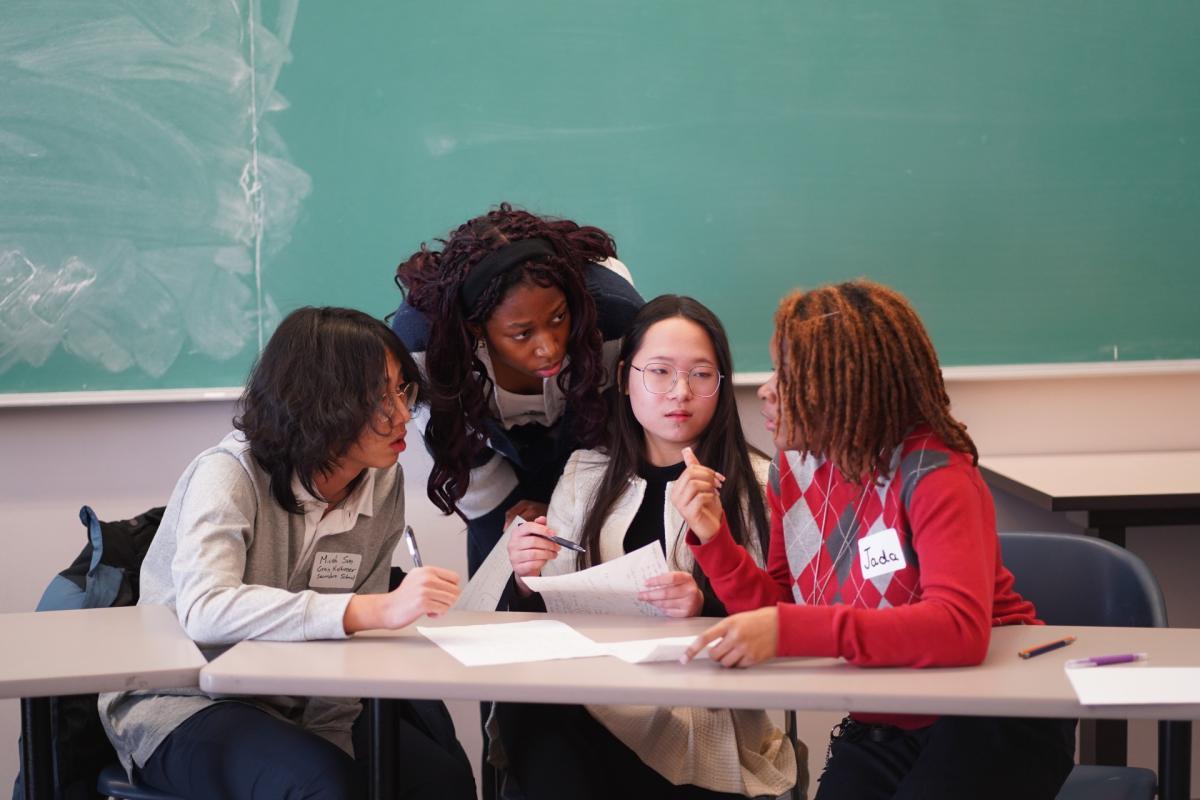 Students working together at a desk