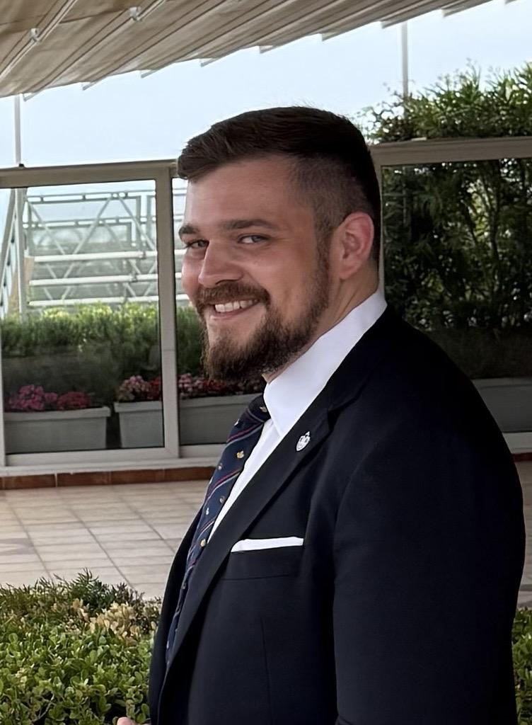 Darren Sargent smiling at camera