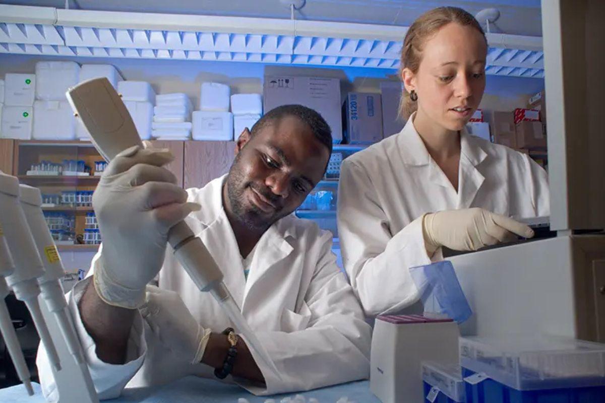 Two students work in the tab test samples