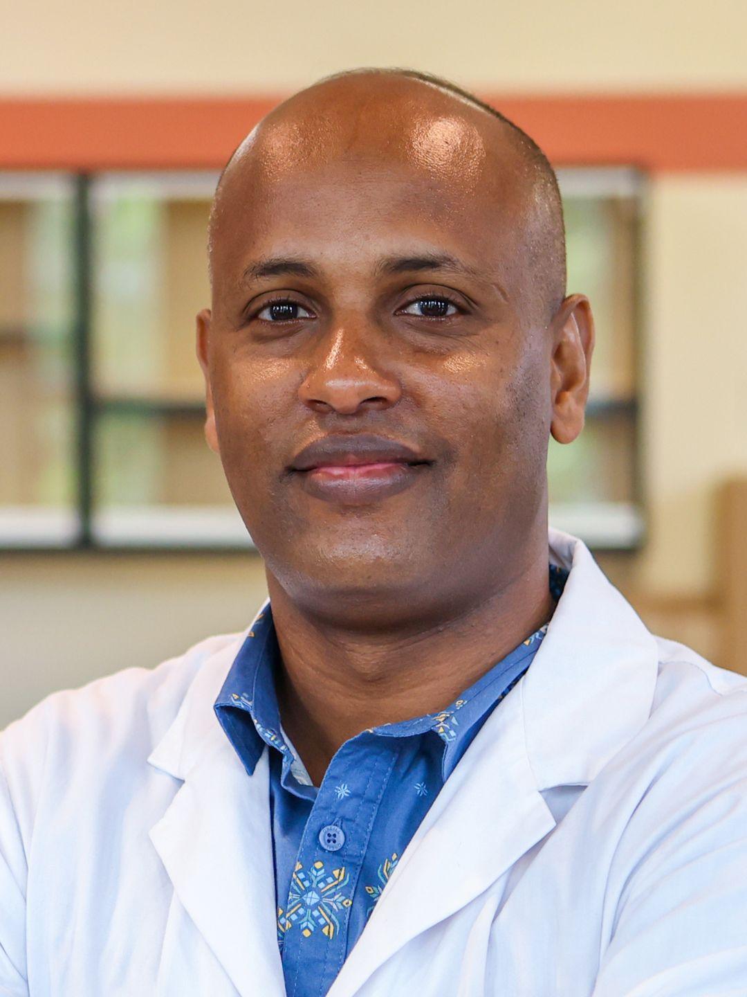 headshot of Dr. Biniam Kebede