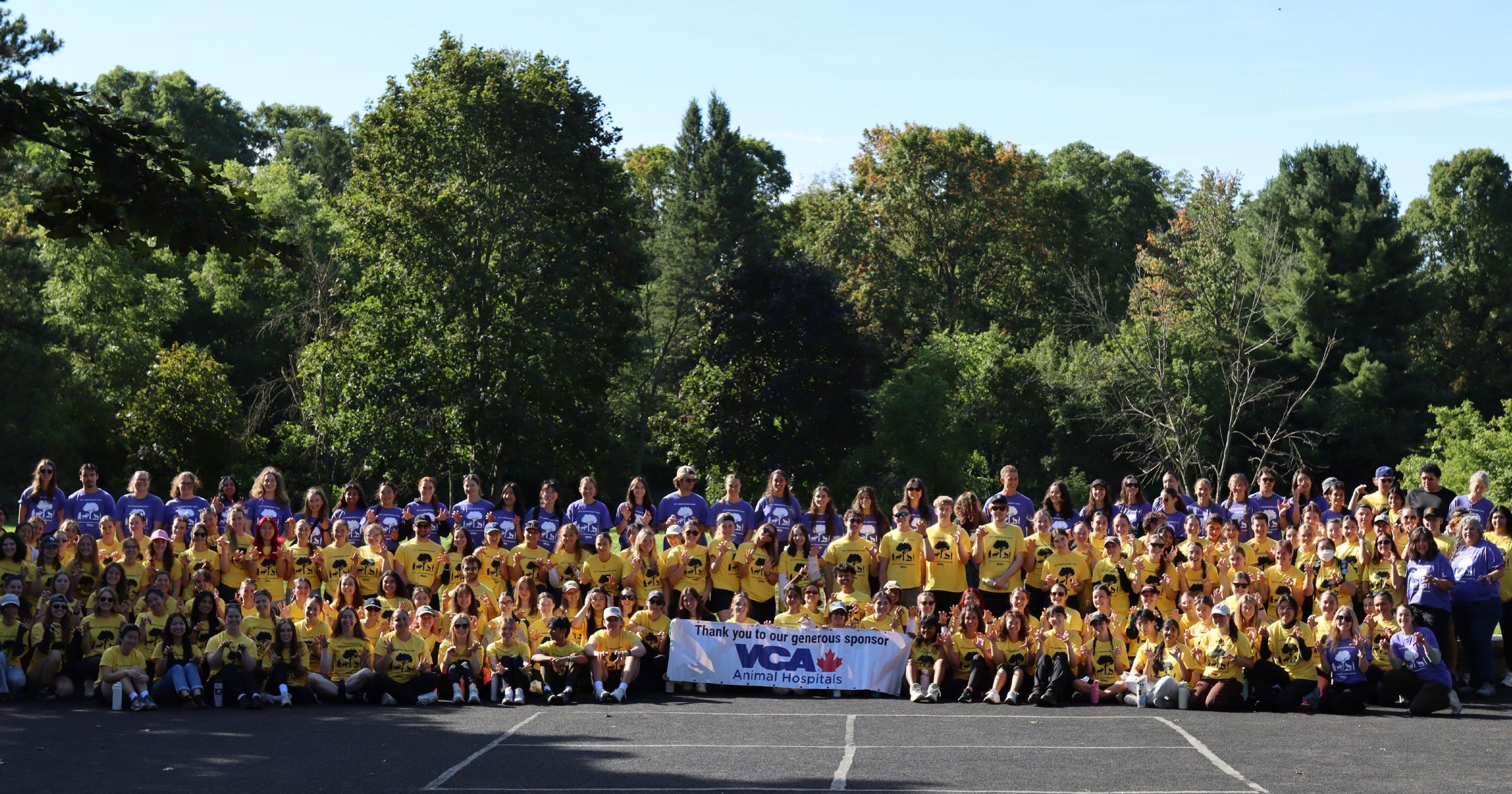 DVM Class of 2030 group shot with VCA Canada sign