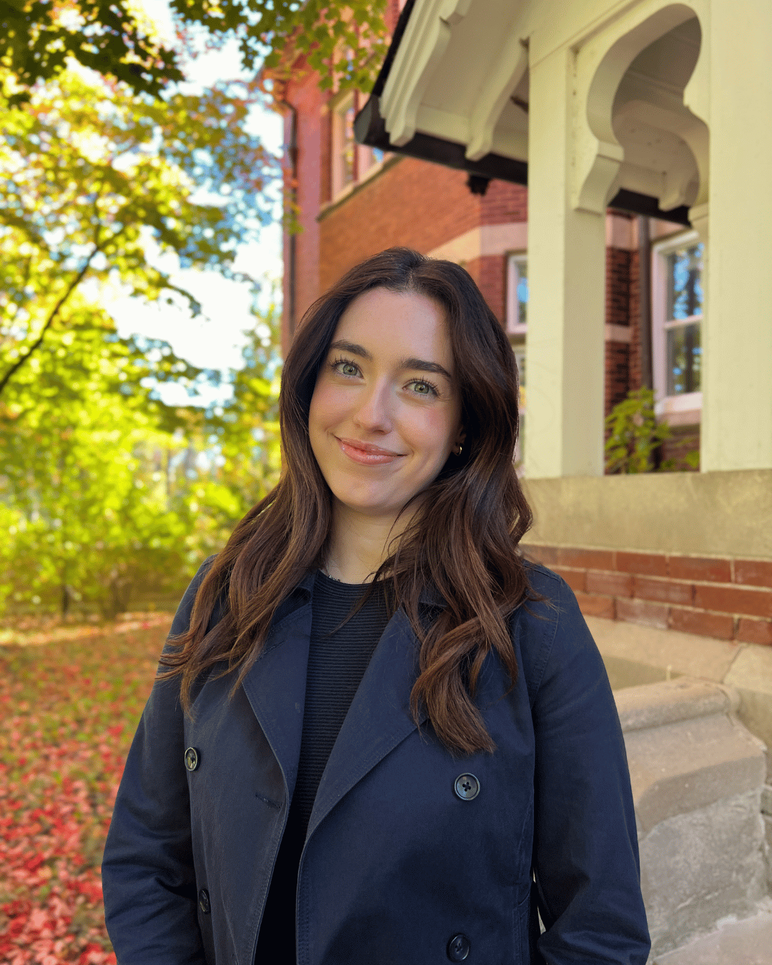 A student smiling at the camera 