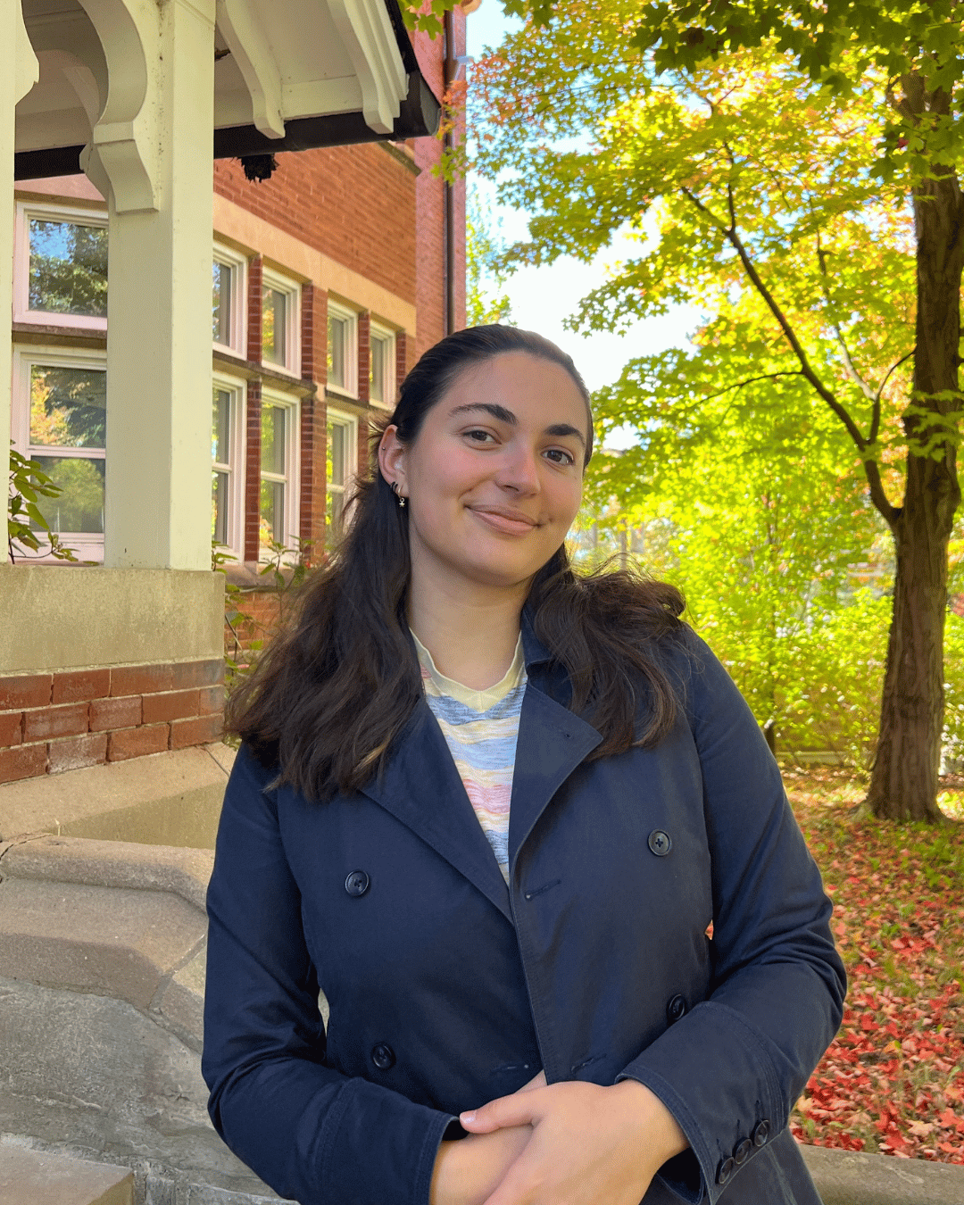 A student smiling at the camera 