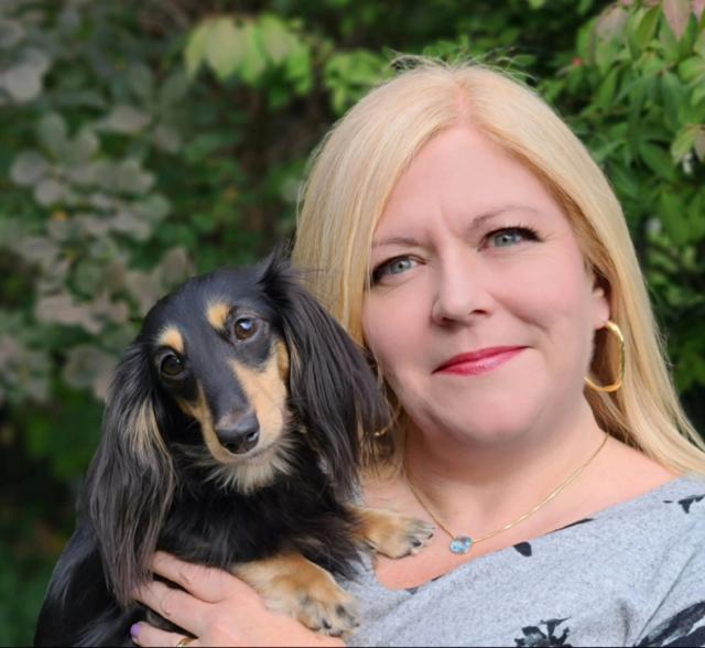 Dr. Karyn Jones is pictured with her dog.