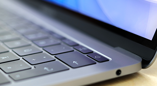 The side of an opened laptop