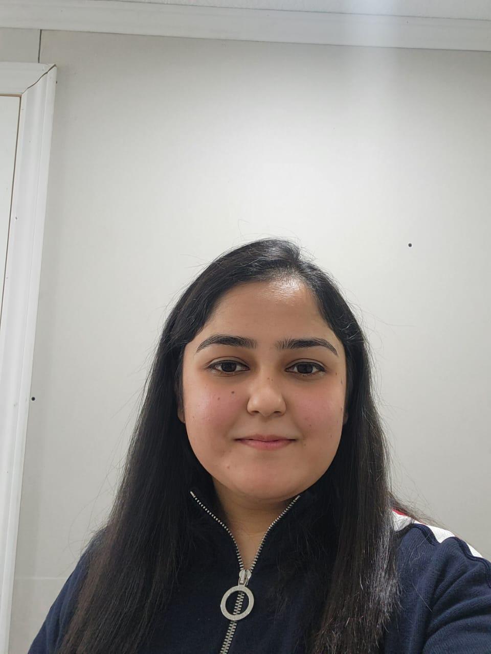 Headshot of Tarika Jain.