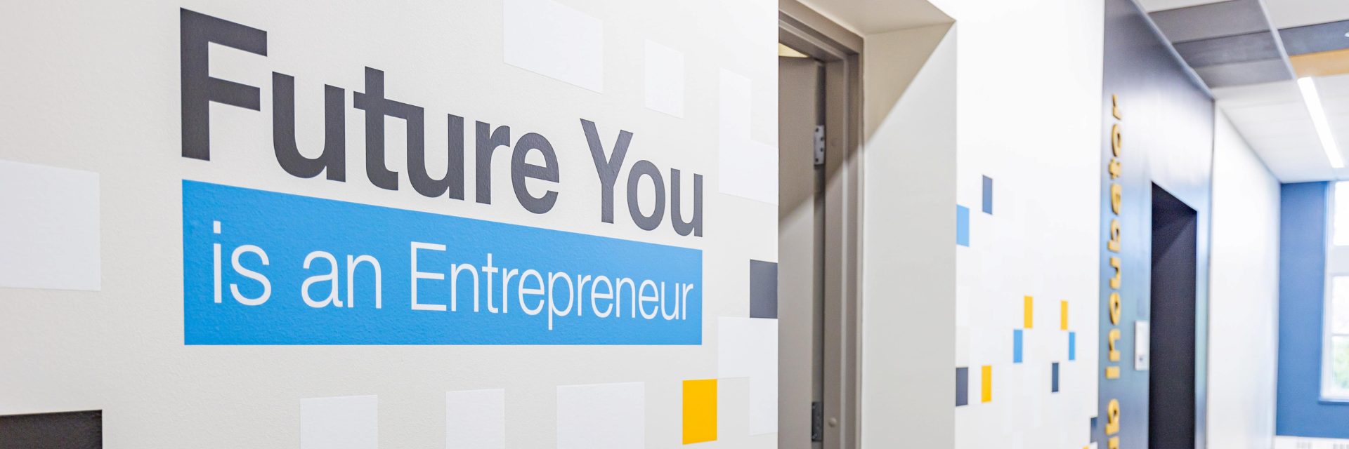 Future You Is an Entrepreneur text on a wall