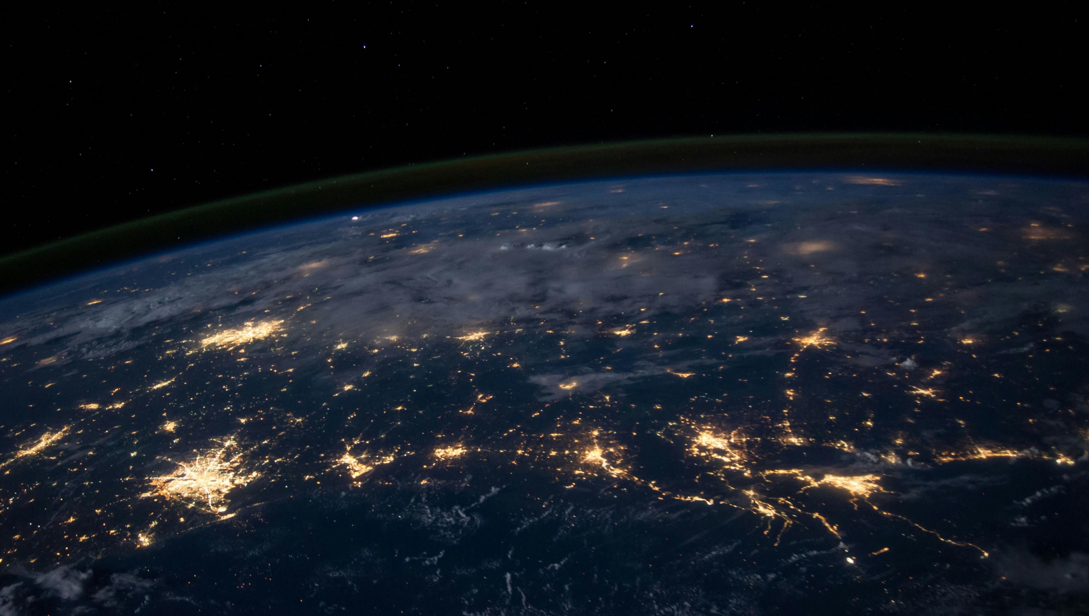 A view of the Earth from space, emphasizing city lights