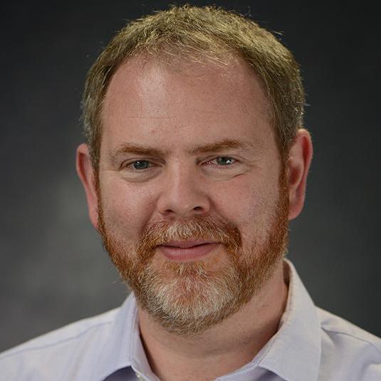 Headshot of Nigel Raine