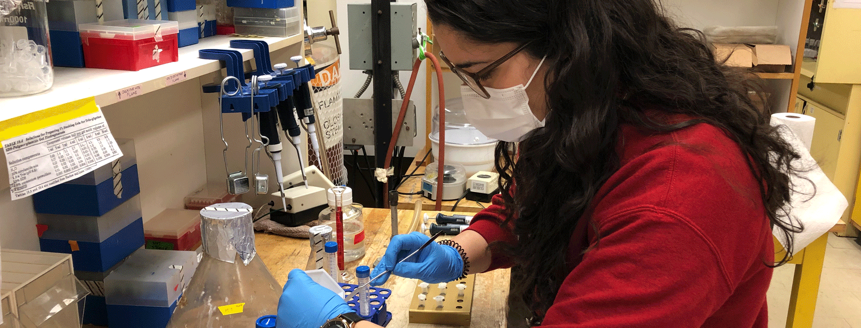 Woman doing an experiment in the lab