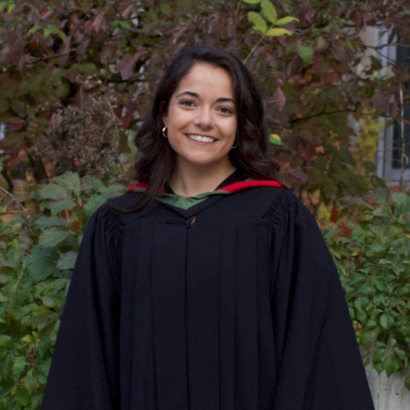 Guelph grad Tiana Bressan posing in her grad gown.