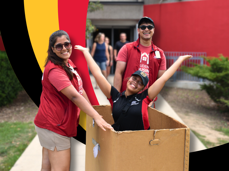 Residence Life Staff in a packing box