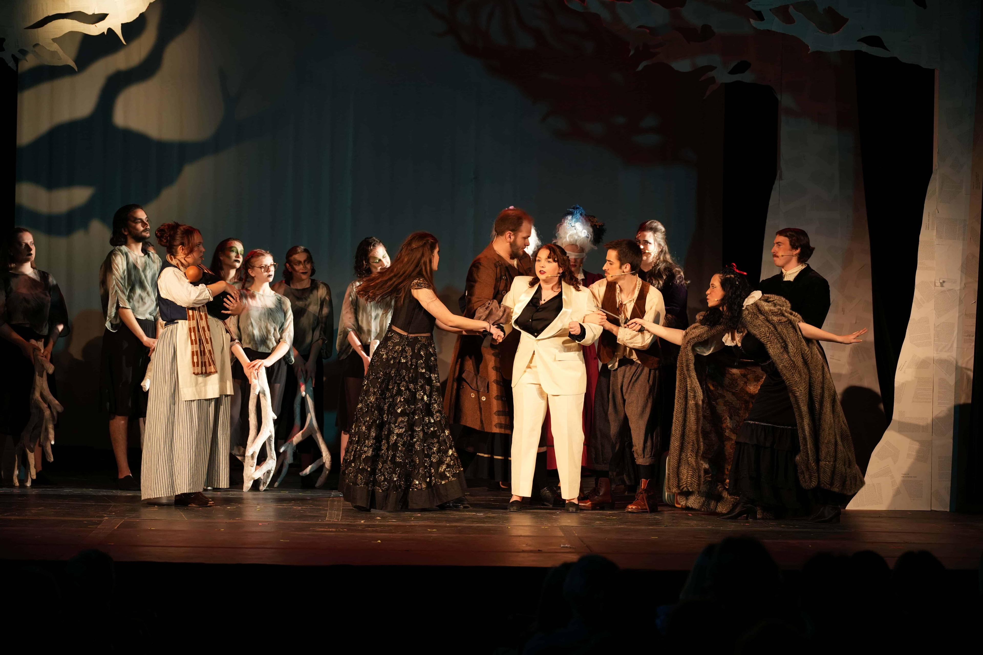 Students performing in into the woods the musical