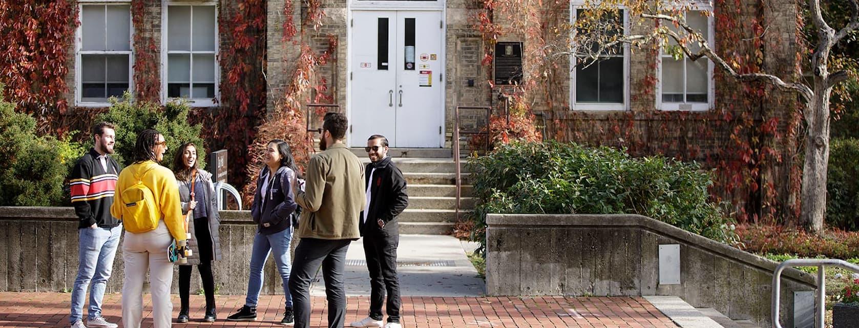 Students speaking outside of Day Hall