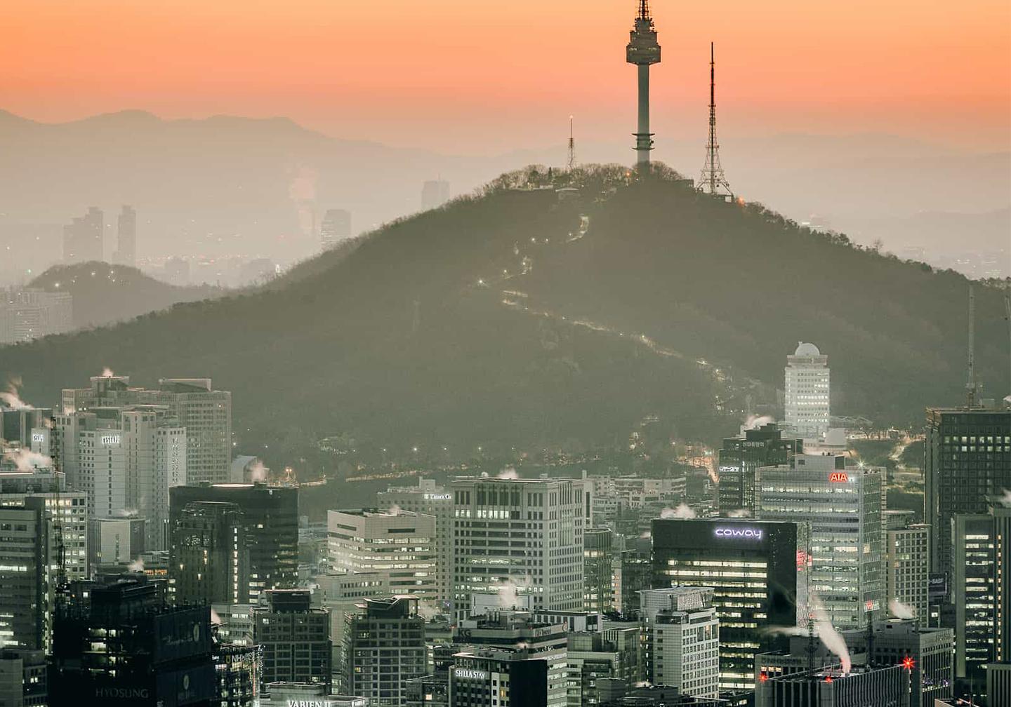 Cityscape in Korea with mountain behind