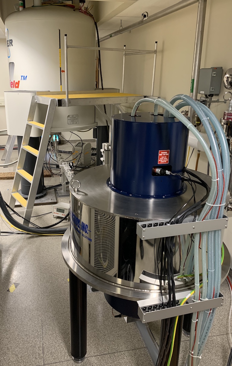 DNP system with gryotron magnet in foreground and NMR magnet in background.