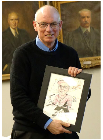 Photo of Jim Fairles with his retirement gift