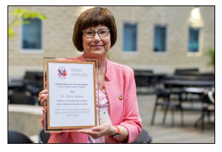 Phot of Dr. Maria Spinato receiving her award