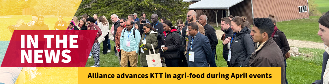 Group of people standing outside the Soil Interpretive Centre. Text reads: In the News: Alliance advances KTT in agri-food during April events. 