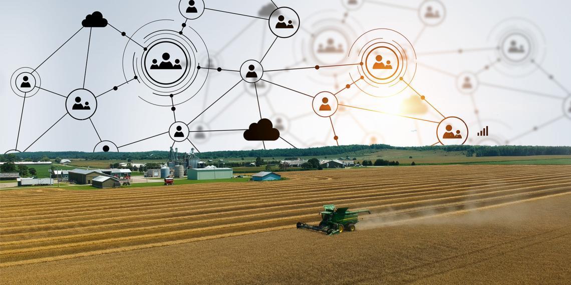 A tractor in a field with connected nodes above it, representing the exchange of knowledge