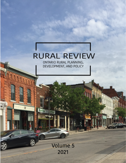 Cover image of volume 5 of the journal Rural Review shows a downtown area with commercial buildings and several cars parked along the street
