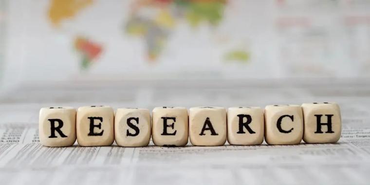 Blocks with letters that spell out the word Research