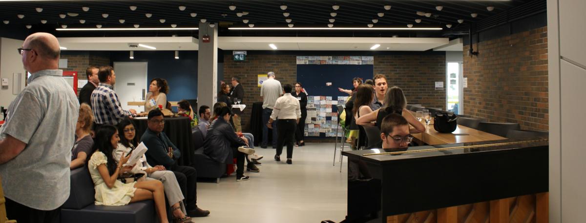 The College of Arts Convocation Awards Ceremony in Summer 2024, attendees and donors socializing in the Arts Research Centre Lobby.