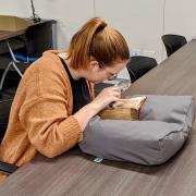 Student curator studies manuscript