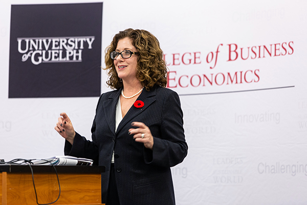 Dean Julia Christensen Hughes speaking at the event