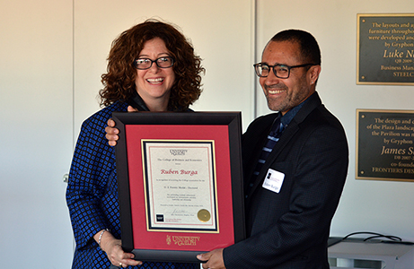 Ruben Burga and Dean Julia Christensen Hughes
