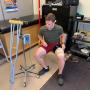 A study participant receiving blood flow restriction and electrical muscle stimulation to prevent muscle atrophy (photo courtesy of J. Burr)
