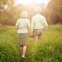 Older people walking down a path