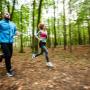 People jogging in forest