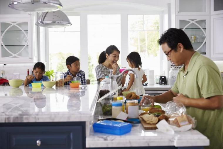 A family having breakfast in the kitchen