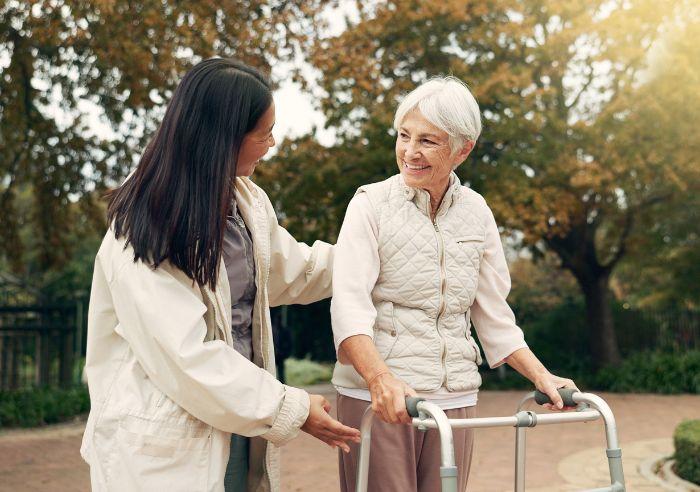 Two women walking outside