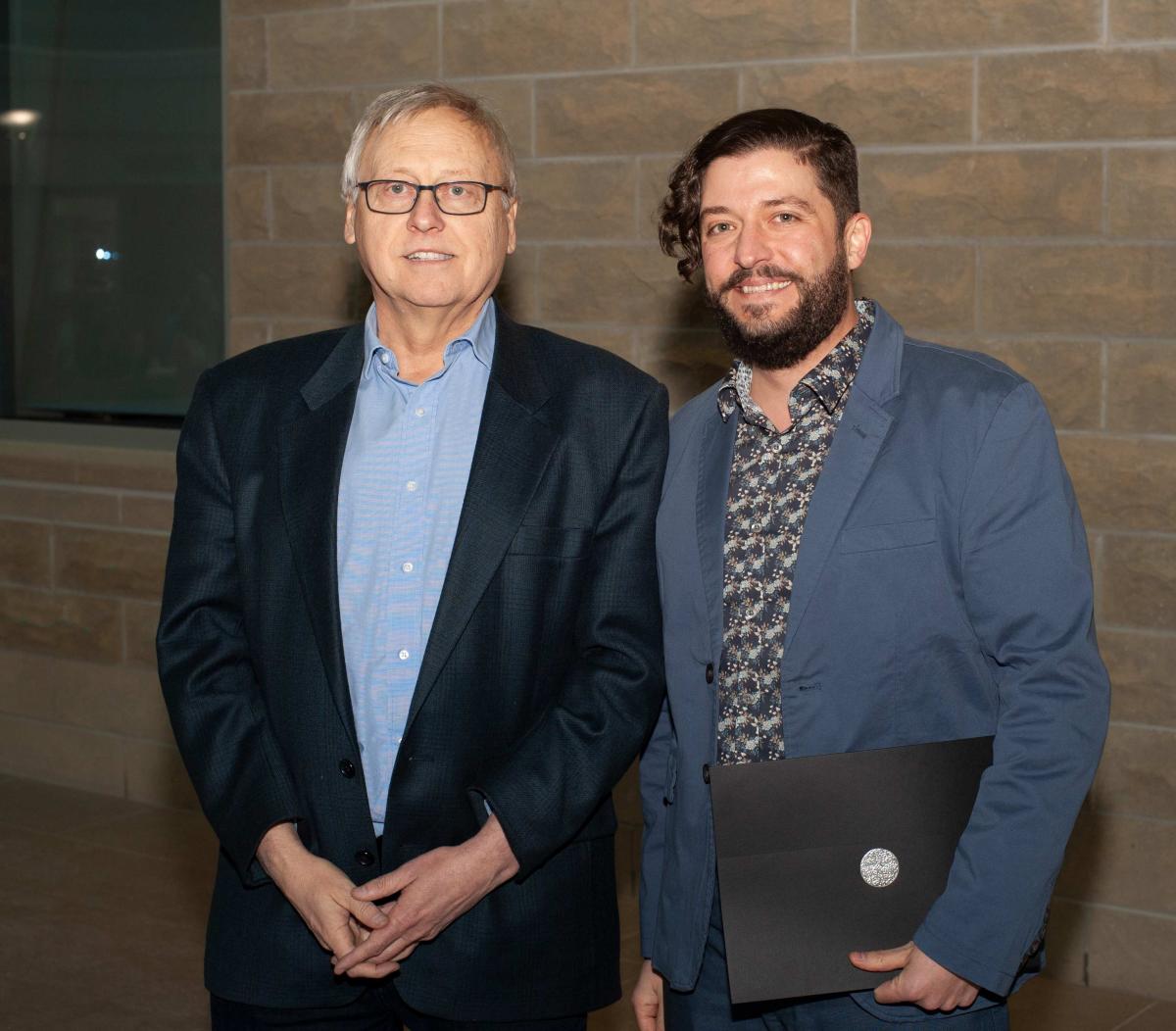 Interim dean of CBS Glen Van Der Kraak and staff teaching award winner Chris Meyer