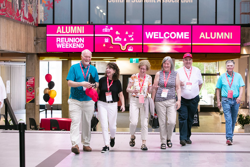 Alumni walk through the University Centre