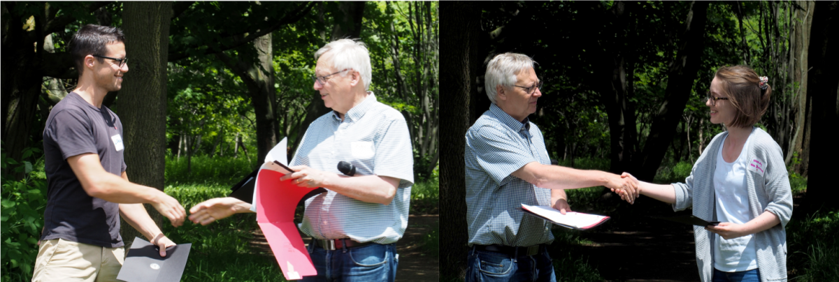 Glen Van Der Kraak presents awards to the winners of the Best Academic Paper award.