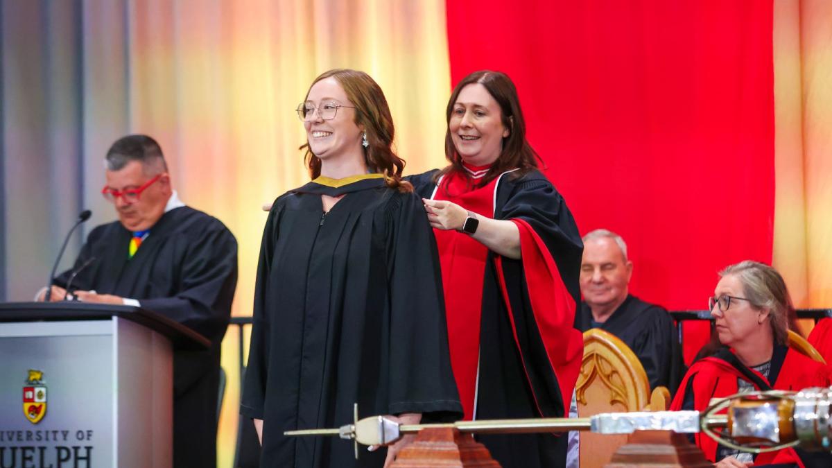 Michaela Hishon smiling on stage